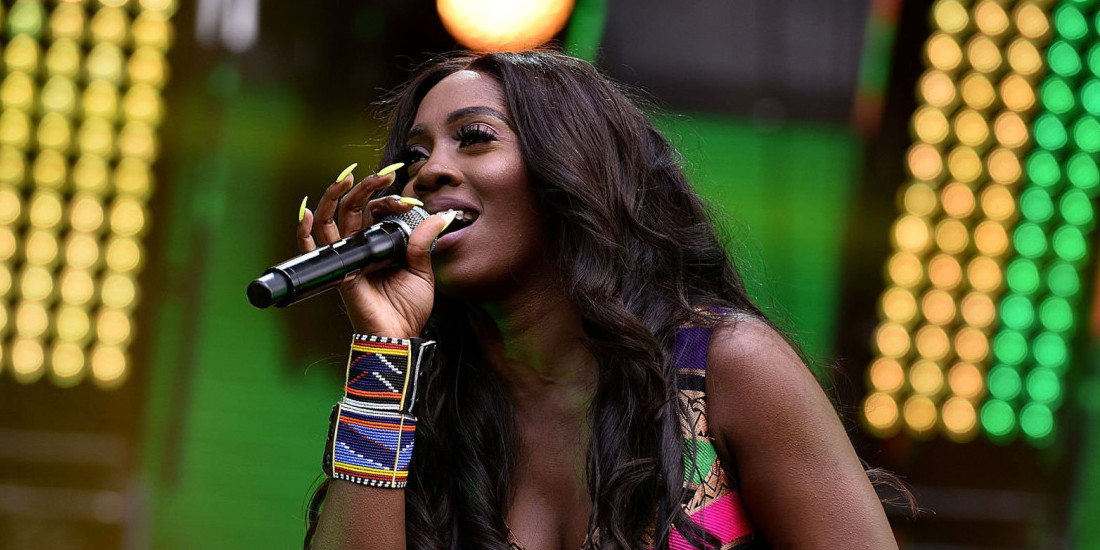 What does Tiwa Savage do for a living?