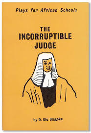 Agbalowomeri, the corrupt establishment officer in 'The Incorruptible Judge', does what when he's caught with a bribe by the police?