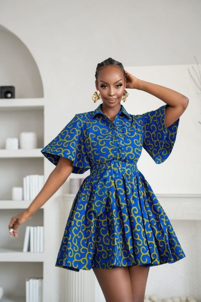 Lady Wearing Flared Dress with Short Bell Sleeves and Belt