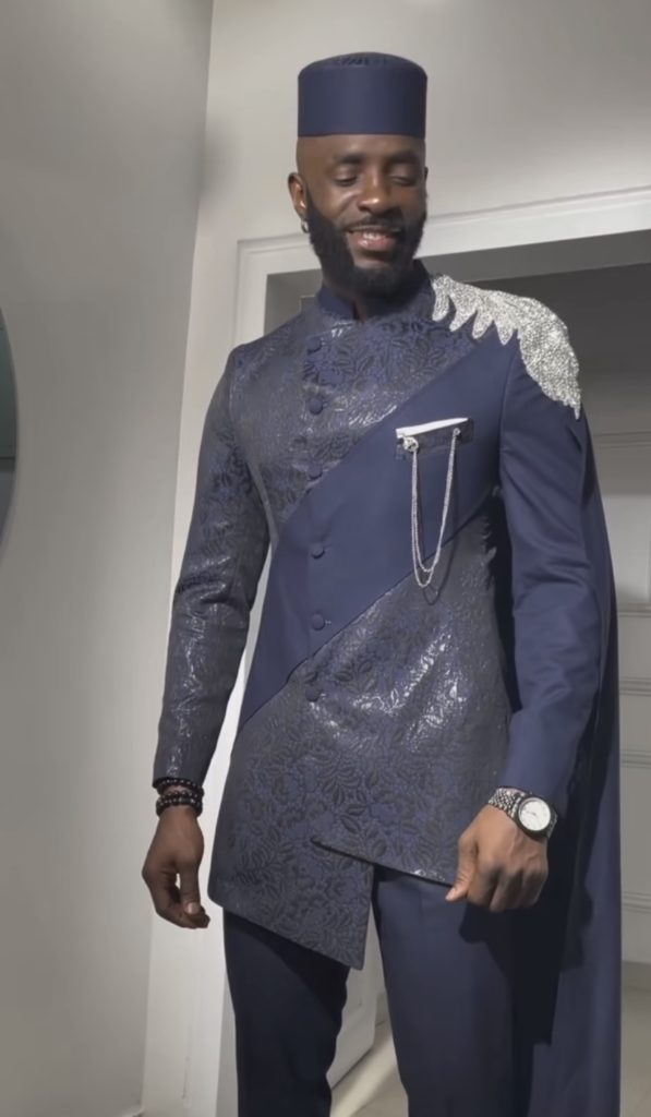 Man Wearing Royal Blue Embellished Senator Agbada Set (with Cape Detail) Senator Design