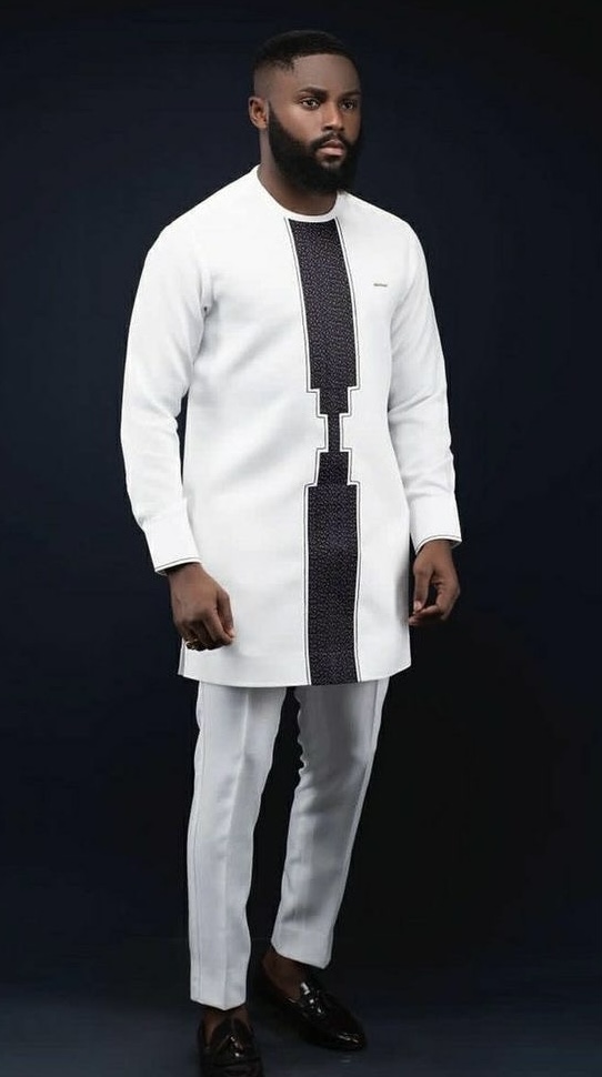 Man Wearing Black Column Cut Senator Design