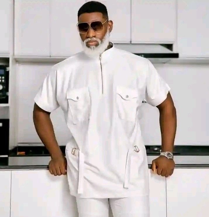 Man Wearing Oversized Flap Pockets and Strap Detailing Senator Design