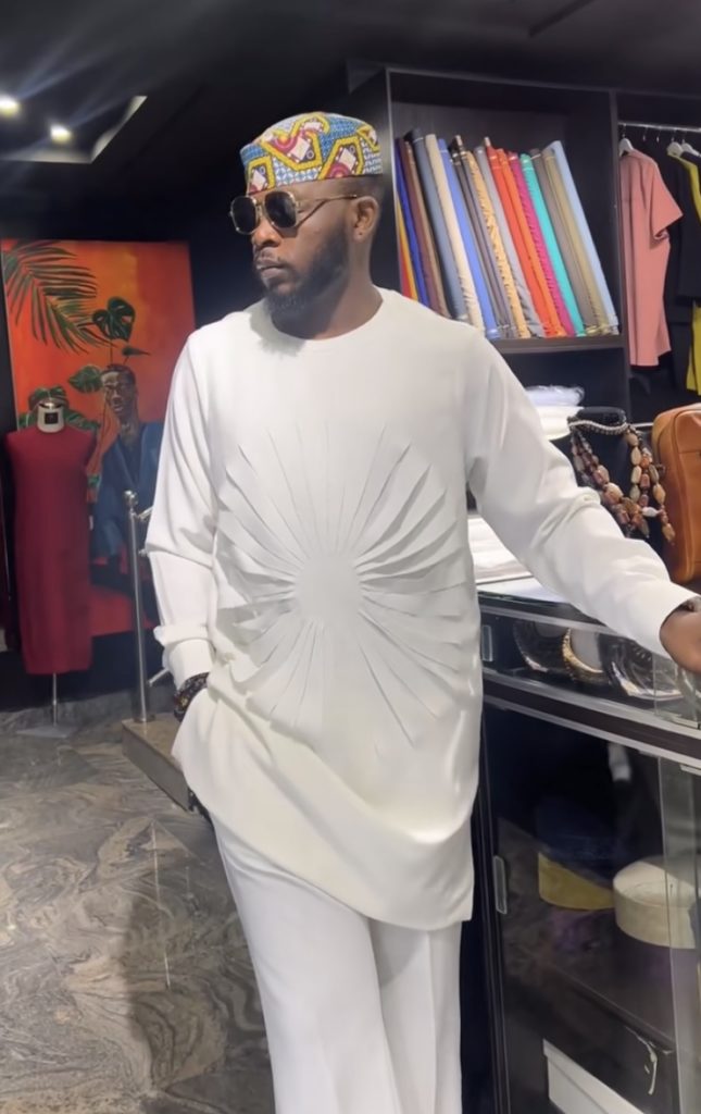 Man Wearing Sunburst Pleat Statement Senator Detail Senator Design