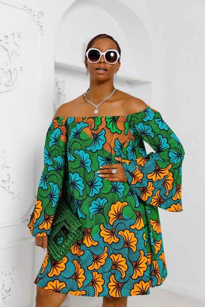 Lady Wearing Off-Shoulder Tent Dress with Bell Sleeves