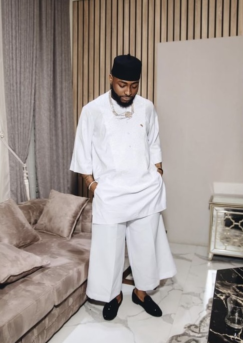 Man Wearing Wide-Leg White Senator with Short-Sleeve Top Senator Design
