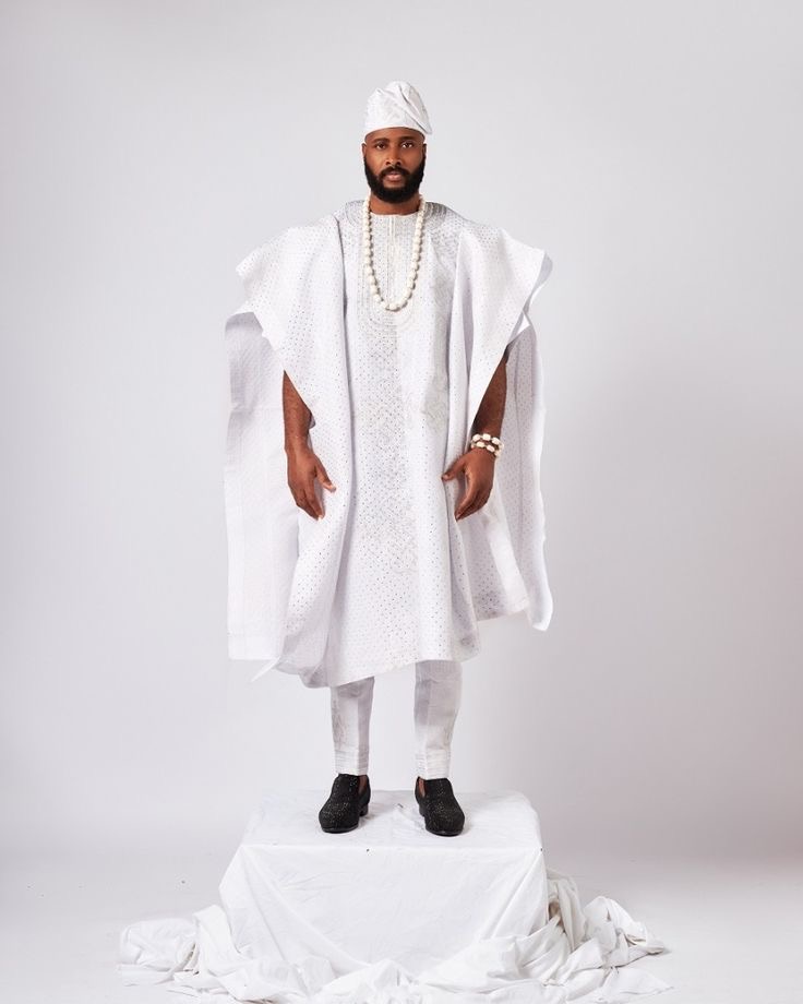 Man wearing The Classic All-White Elegance Agbada style for men