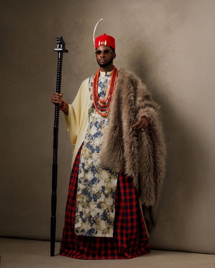 Groom wearing Igbo-Inspired Agbada with Fur Shawl Agbada style for men