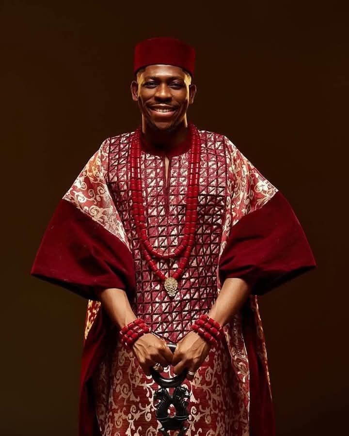 Groom wearing Royal Igbo Crimson Agbada style for men