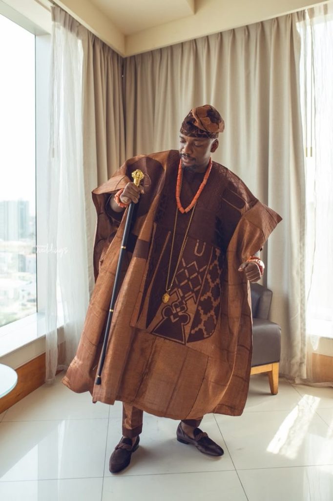 Groom wearing Bronze Royal Aso-Oke Agbada style for men