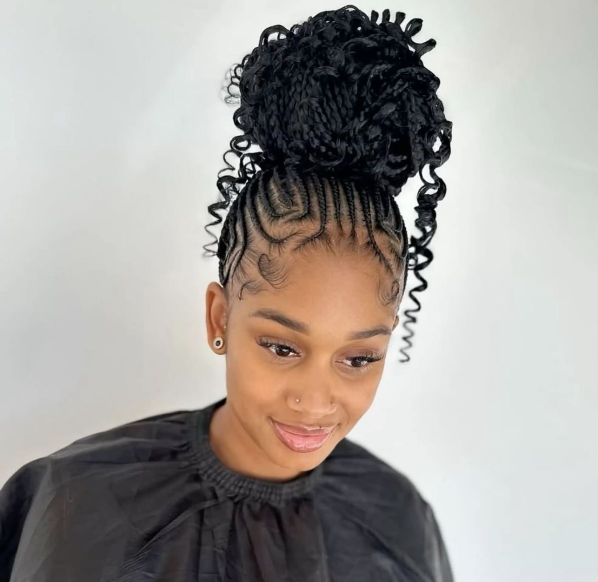 Lady on Tribal Braids with Curls – High Braided Bun with Spiral Curls