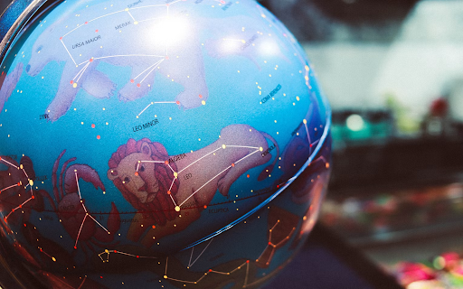 Zodiac signs on a globe.